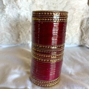 Indian bangles in maroon and gold color